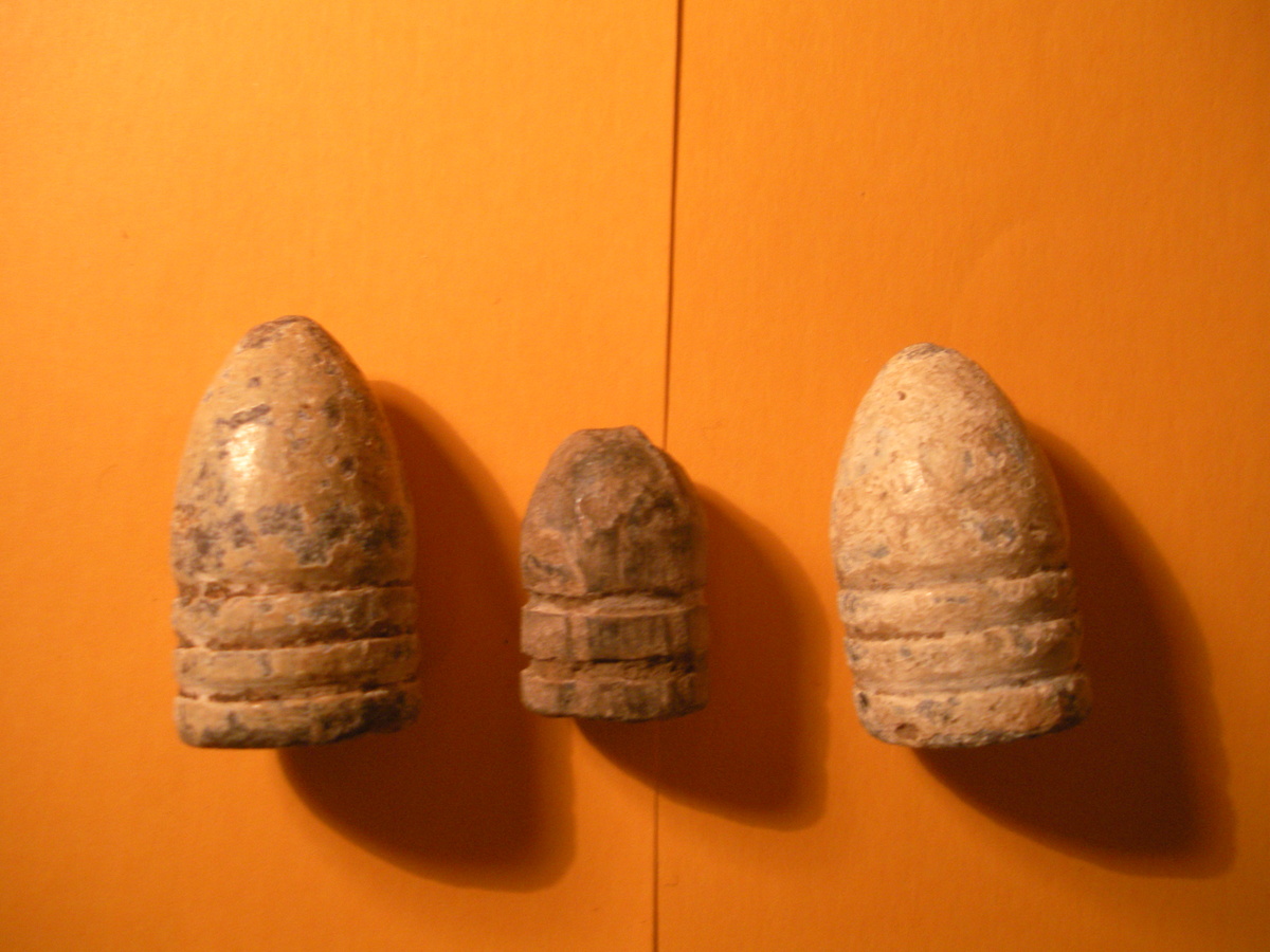 Civil War Bullets - Minie balls  -- One is a confederate and was fired in Texas - Military and Wartime