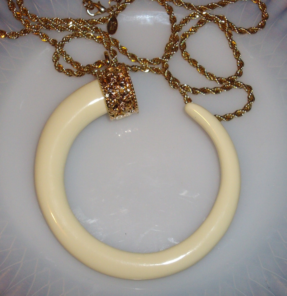 KJL necklaces and a Trifari set.