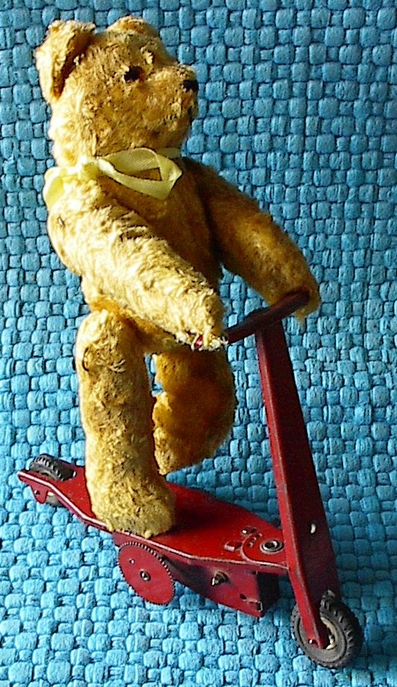 Antique Fewo Teddy Bear on a Scooter Toy