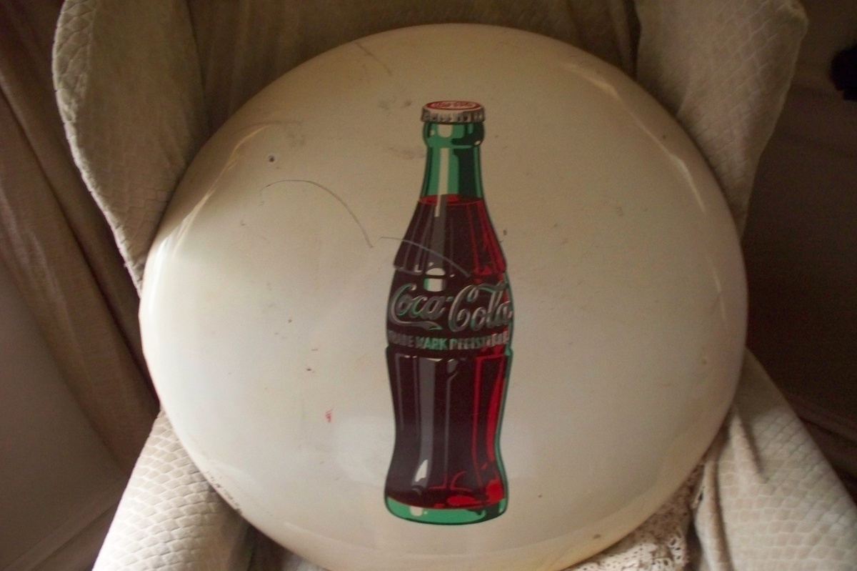 coca cola button sign