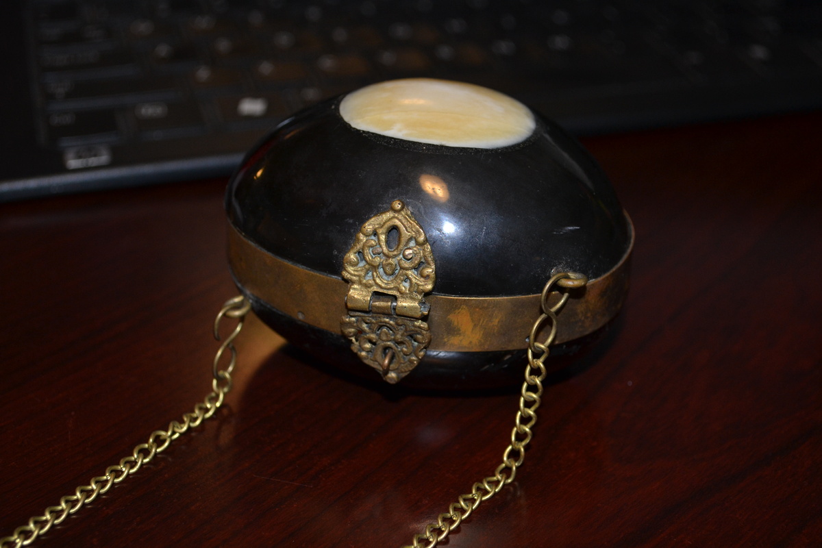 Egg shaped brass and possibly Ivory clutch