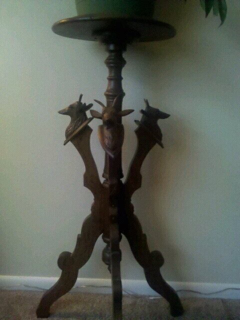 Three legged plant stand