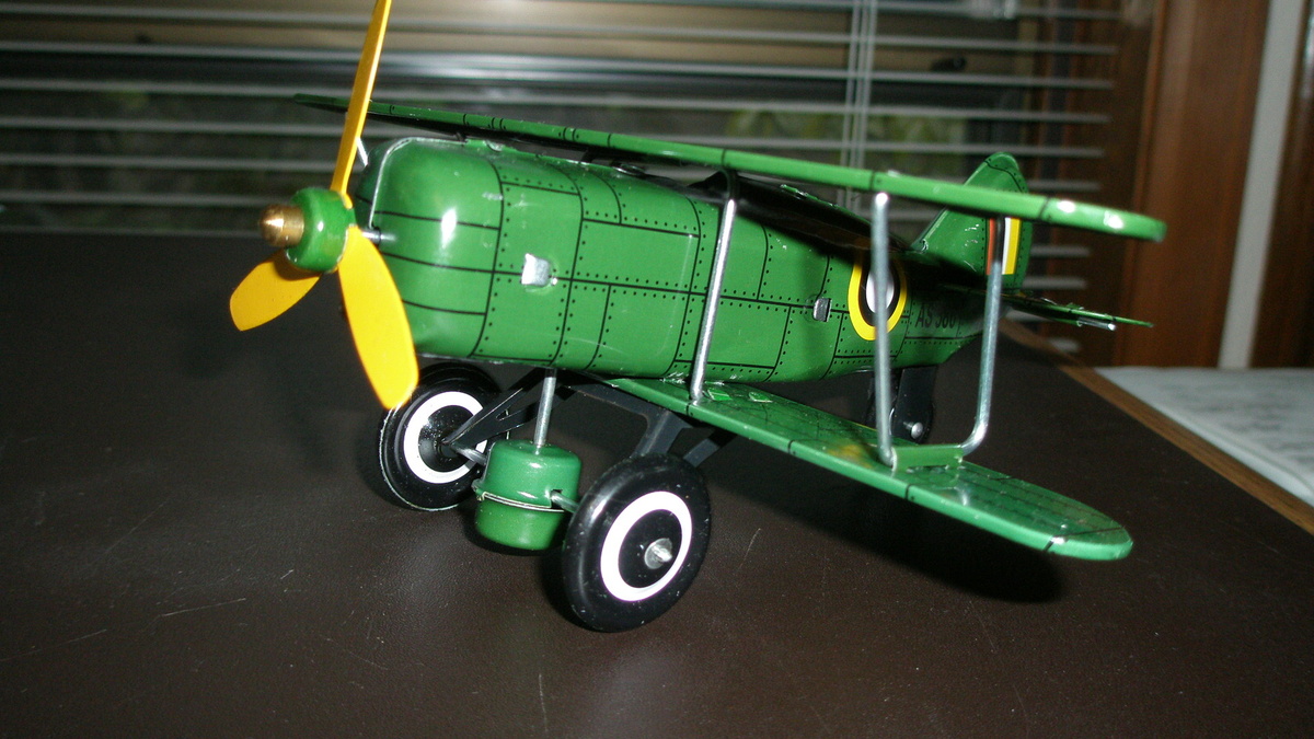 Toy wind-up Bi-Plane and Zeplin