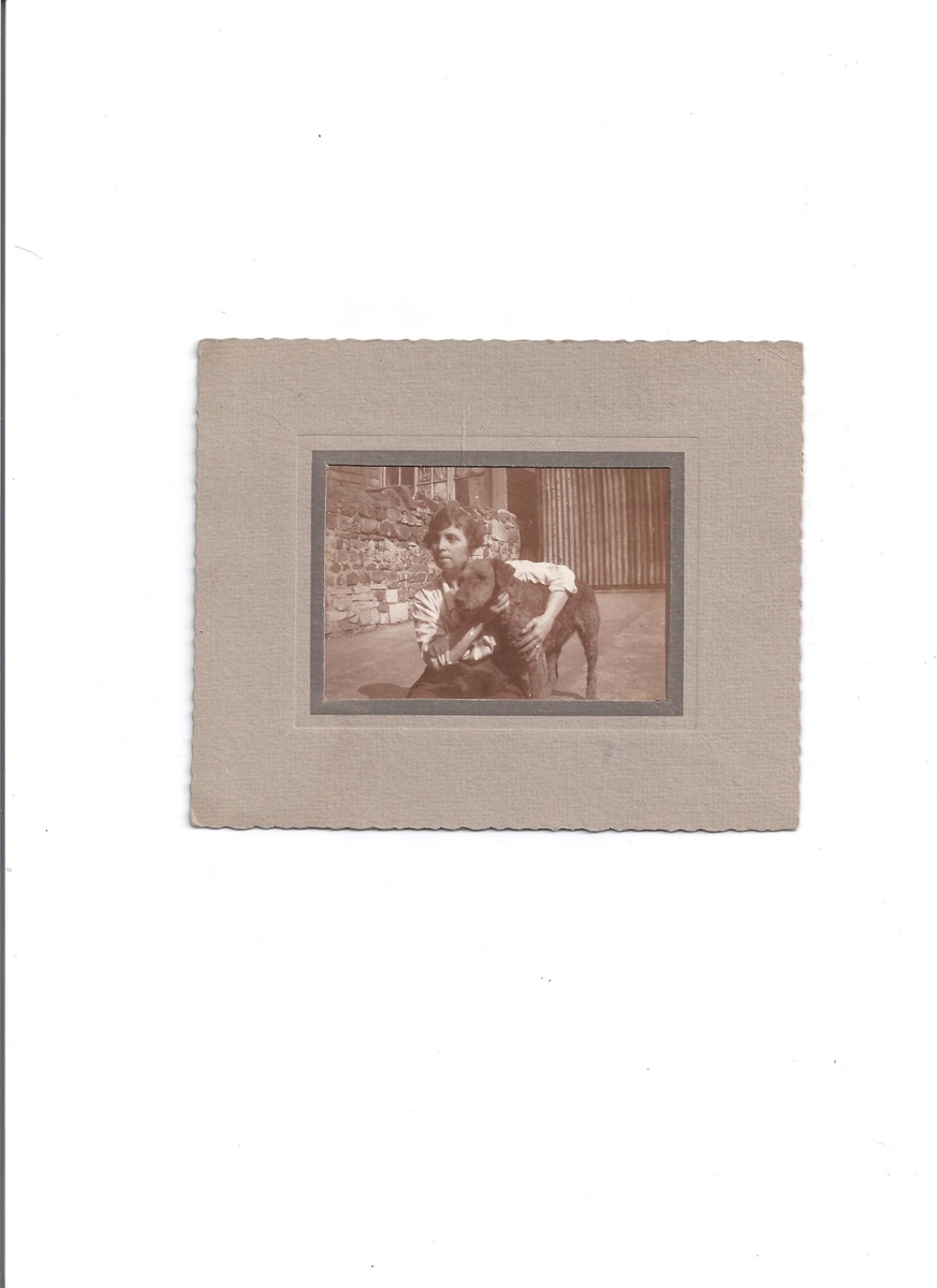 A LADY WITH HER DOG