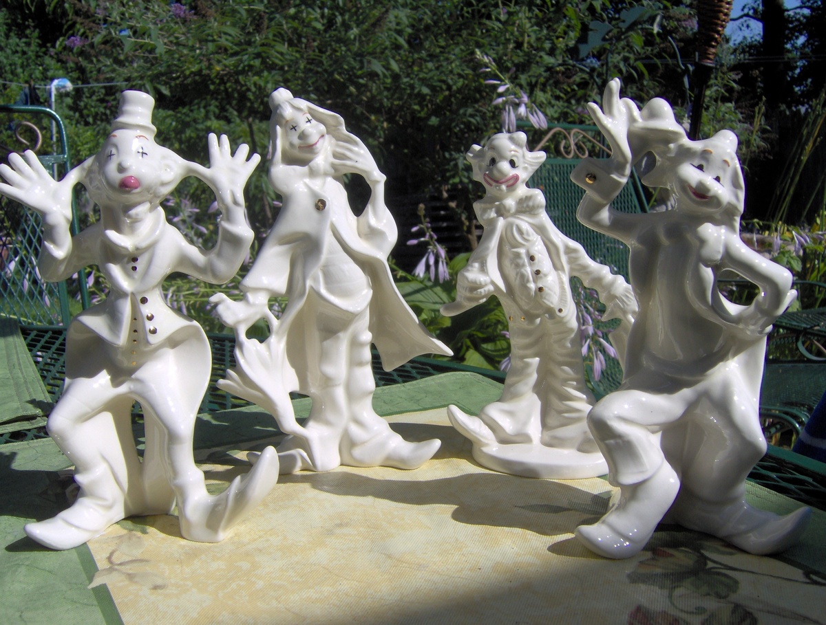 Porcelain Clowns trimed in Gold - Art Pottery