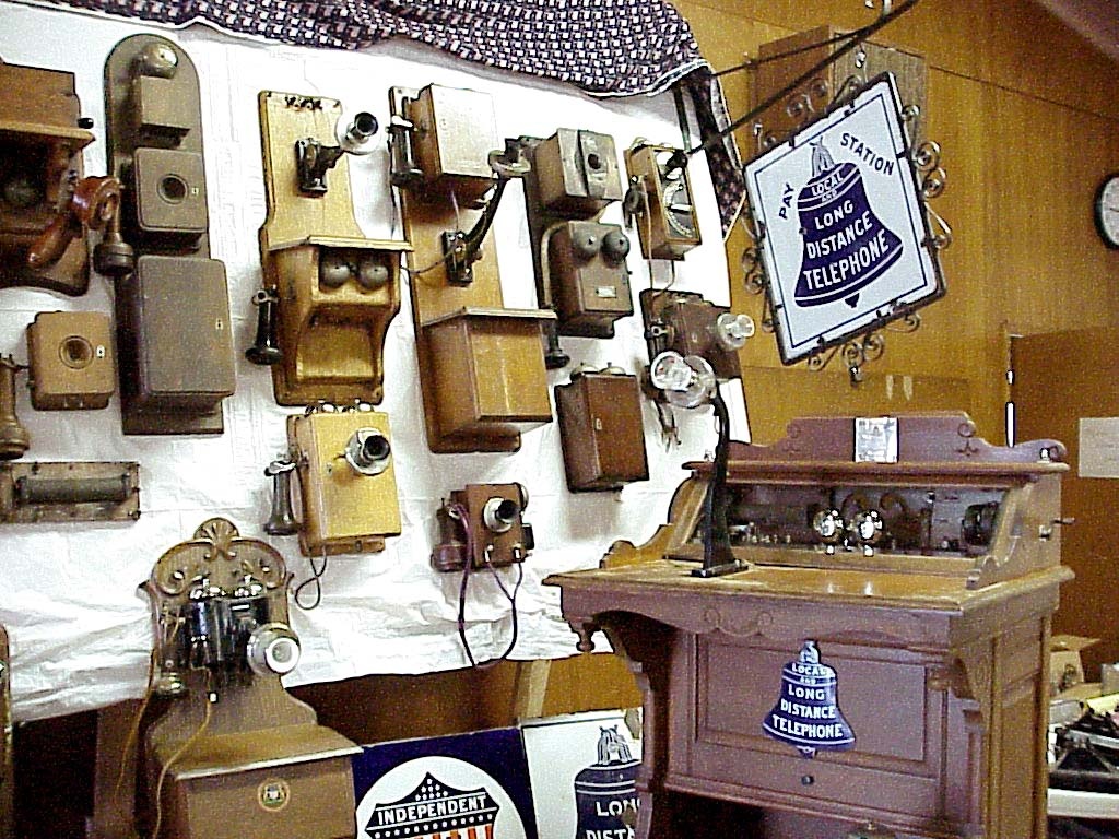 Amazing early wood telephone display at the 2007 TCI San Jose phone show - Telephones