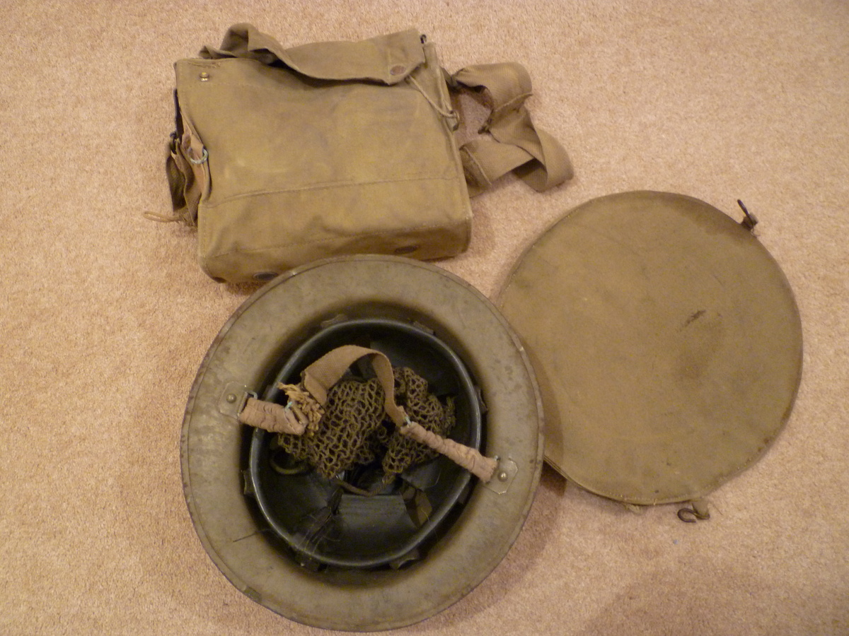 Complete British WW11 gas mask/carrier/helmet set.