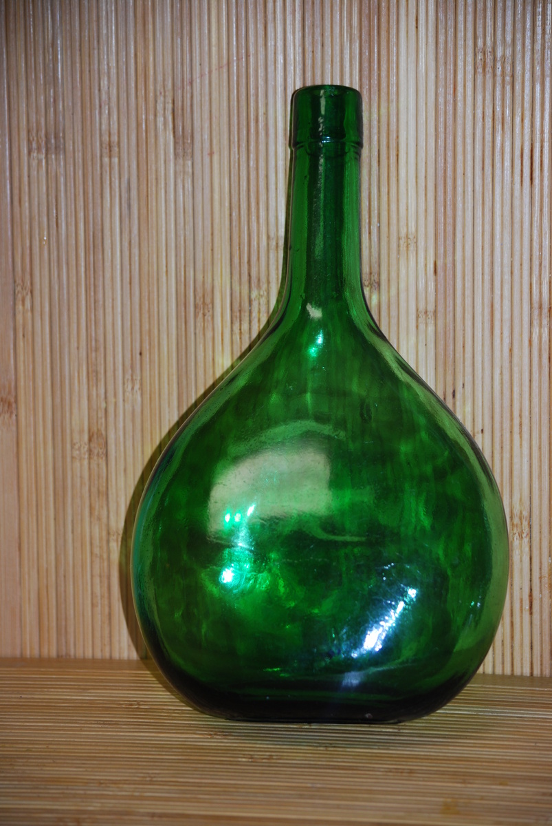 hand blown glass flask, or demijohn bottle