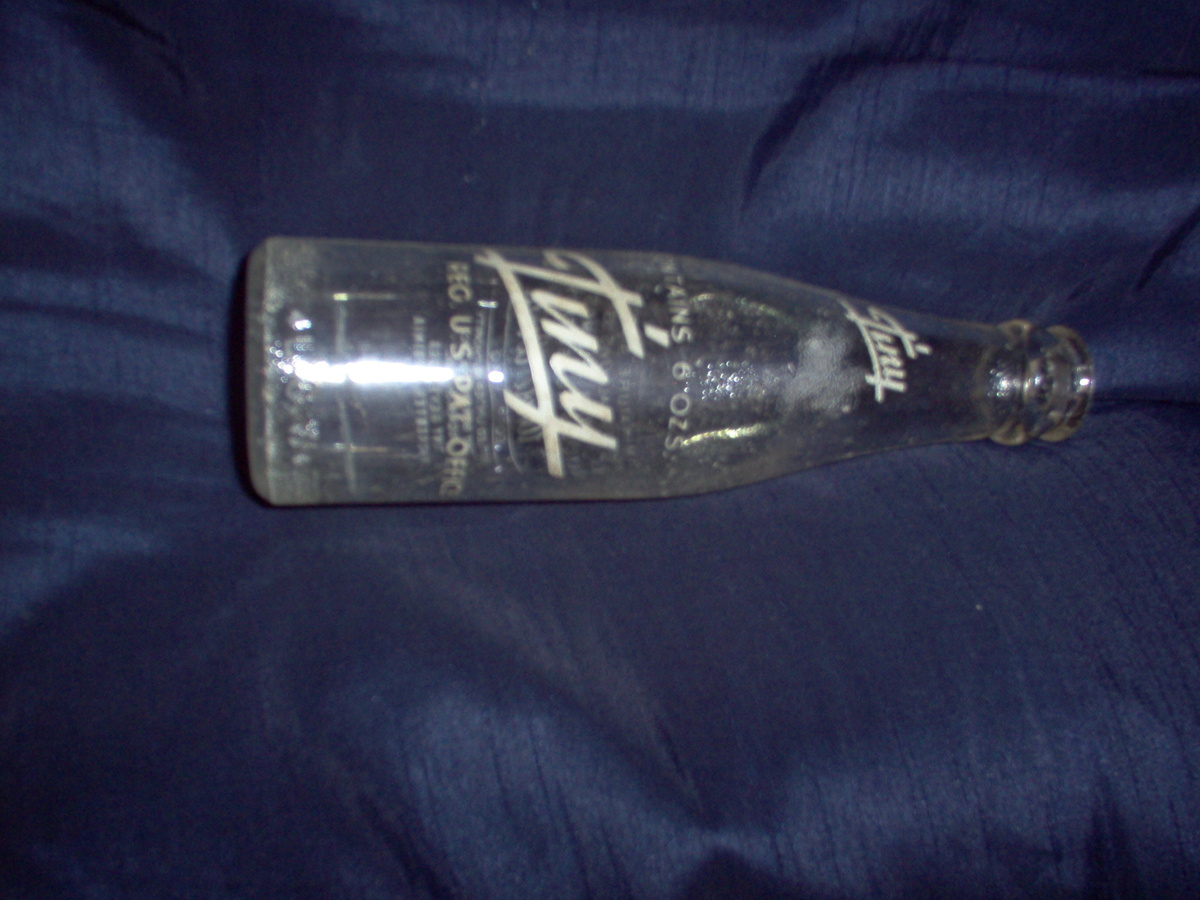 "Tiny" soda bottle