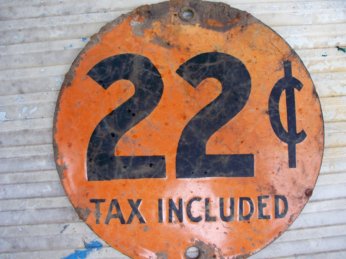 old round disc 22 cent incl tax and 22 1/2 cents incl tax on otherside