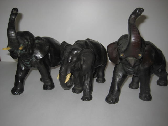 Bronze elephants with ivory tusks