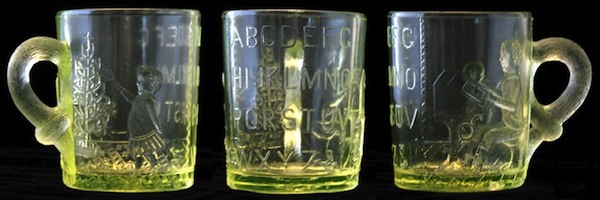 An Adams &amp; Co. Vaseline glass mug to help children learn their ABCs, circa 1880s. Photo via Dave Peterson at <a href="http://www.vaselineglass.org/">VaselineGlass.org</a>